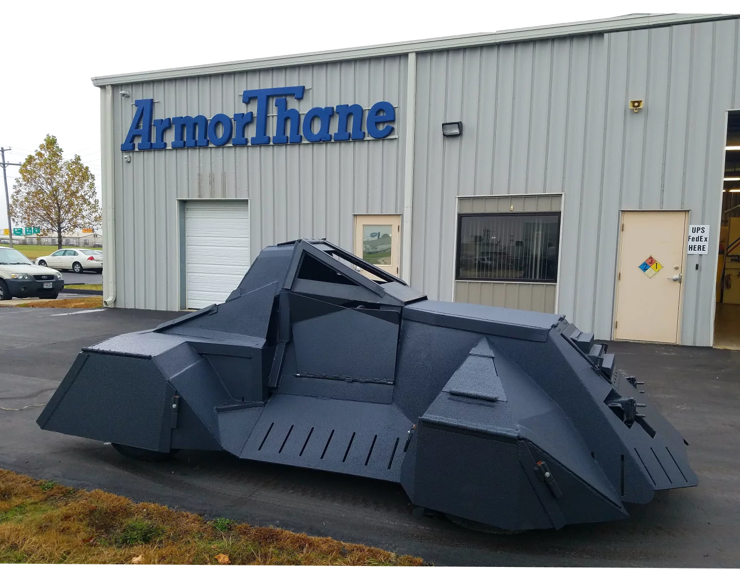Polyurea-coated armored vehicle outside ArmorThane's facility