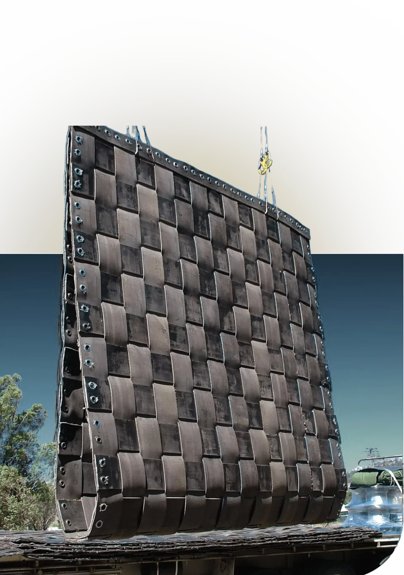 Large wall panels coated in black polyurea for blast resistance